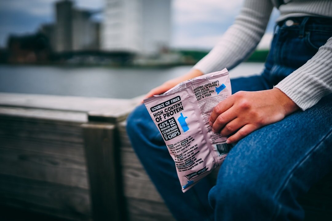 Close-up of hands holding a newspaper with pension news